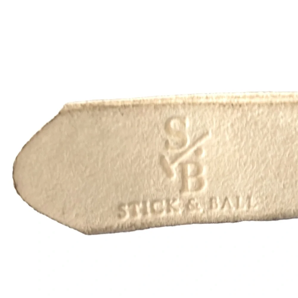 Stick & Ball‎ Corrento Size Large off white leather polo belt. Brass buckle.